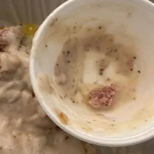 Raw sausage in the Biscuit and Gravy.