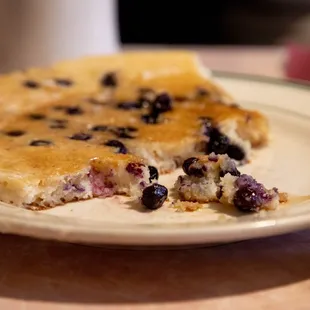 a plate of blueberry pancakes