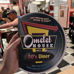a person holding a paper plate