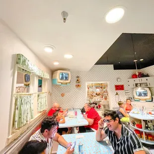 a group of people sitting at a table