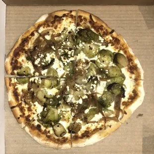 New Brussel Sprout Pizza! marinara, Brussel sprouts, onion, garlic, goat cheese and mozzarella!