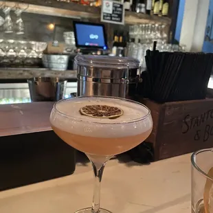 a cocktail at a bar