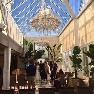 Greenhouse-like feel. Seats about 60 people comfortably. They had the ceremony, dinner &amp; dancing all in this area.