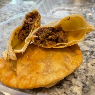 the inside of a meat and cheese empanada