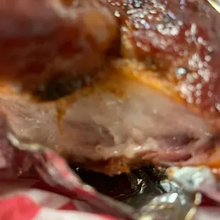 a piece of meat on a fork