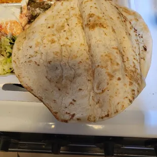 Homemade tortillas that come with fajitas. Thicker and more absorbent than store bought. Delicious flavor. Arrived piping hot.