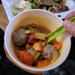 Albondigas soup ($14.99)  tasty broth. Come with 3 meatballs, carrots, celery, and tomato, and rice and beans.