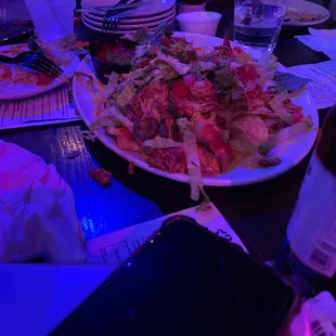 Nachos. Mediocre per nephew. But ALOT.