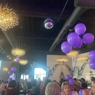 purple balloons in the air