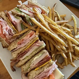 Club sandwich and fries