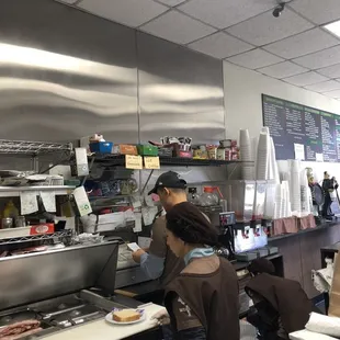 a woman working in the kitchen