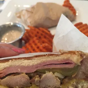 Yummy Cuban sandwich with sweet potato waffle fries