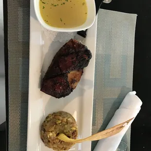 mofongo and pork belly with chicken broth