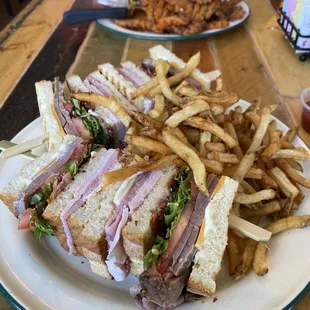 Club sandwich with fries and a bacon jam burger. Everything was delicious.