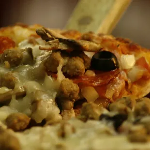 TRY OUR LOADED PIZZA, KNOWN AS E.B.A.