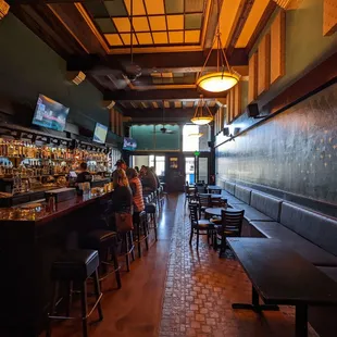 A long, quiet moment staring down the bar.