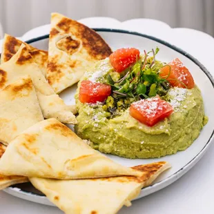 Our Avocado Hummus comes with salty pistachios and tangy grapefruit.