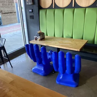 Seating area with cool looking chairs.