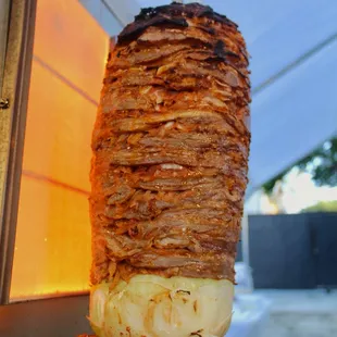 a skewer of meat on a stick