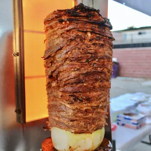 a skewer of meat and vegetables