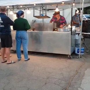 Cook wearing no mask!