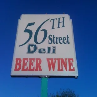 a sign for beer wine