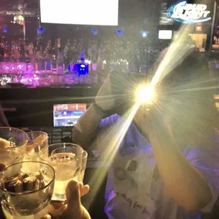 a man holding a glass of beer