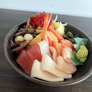 We serve Chirash with beaded of Sushi rice,fresh fishes and variety of pickles(Dine-in Photo)