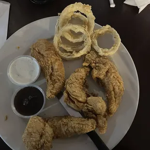 Chicken strips and onion rings.