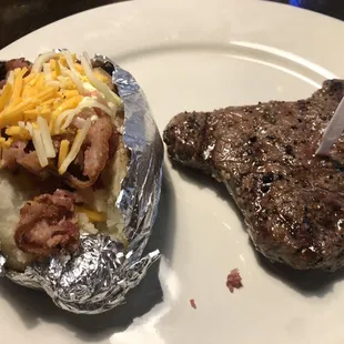 8oz Sirloin Steak with Baked Potato.