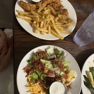 Chicken tenders comes with 2 sides-chose fries and house salad