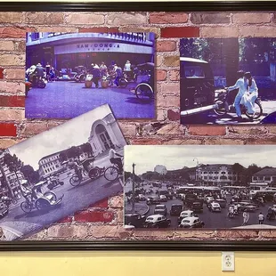 a brick wall with a variety of photos