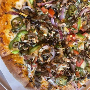 a pizza with various toppings