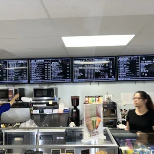Inside of business. The menu in the background.
