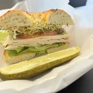 Turkey sandwich on jalapeño cheese bagel