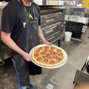 Pepperoni and green pepper NY style pizza