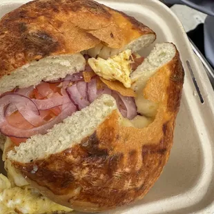 Egg, cheese, onion, tomato bagel