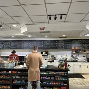 a man standing at the counter
