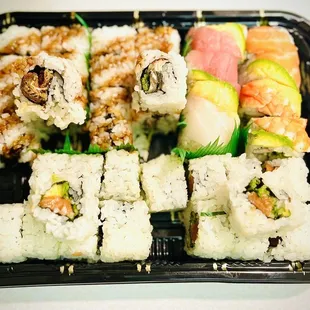 Salmon skin roll ,Eel Roll, Rainbow Roll, 2 Salmon Avocado Rolls.