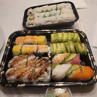 two trays of sushi