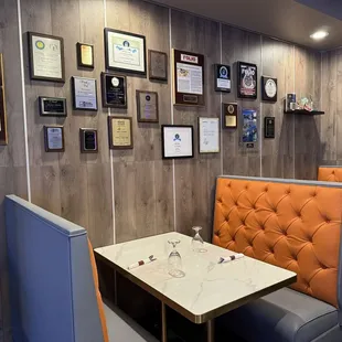 Plaques and awards at the bar area when you enter the restaurant