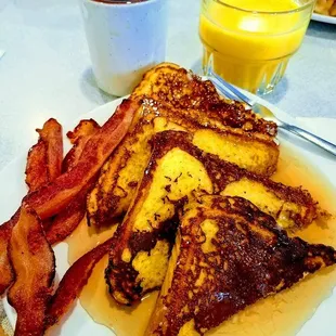 Delicious Texas French toast made with their secret recipe along with hickory smoked bacon!