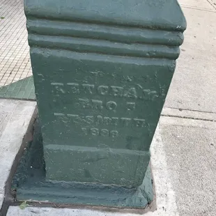 Really old plaque on the column outside. Interesting architecture. Survived the tornado of 1996