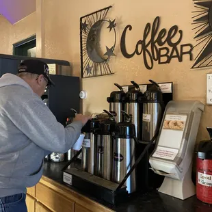 a man preparing coffee