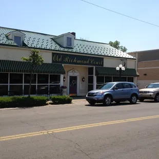 cars parked in front of the building