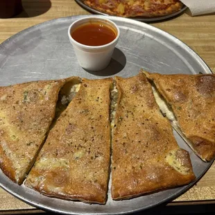 Italian sausage and mushroom calzone.
