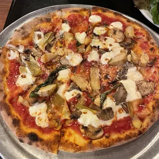 Ortolano pizza--marinated mushrooms, artichokes, fresh mozzarella.
