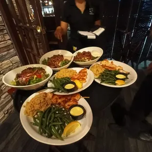 a table full of plates of food