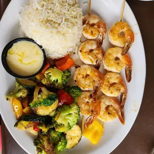 Shrimp skewers, rice and grilled veggies