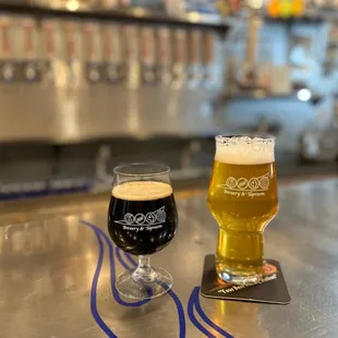 a glass of beer and a glass of beer